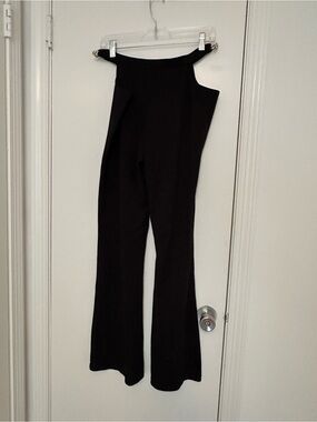Motel Black Wide-Leg Pants with cut-out and gold chain